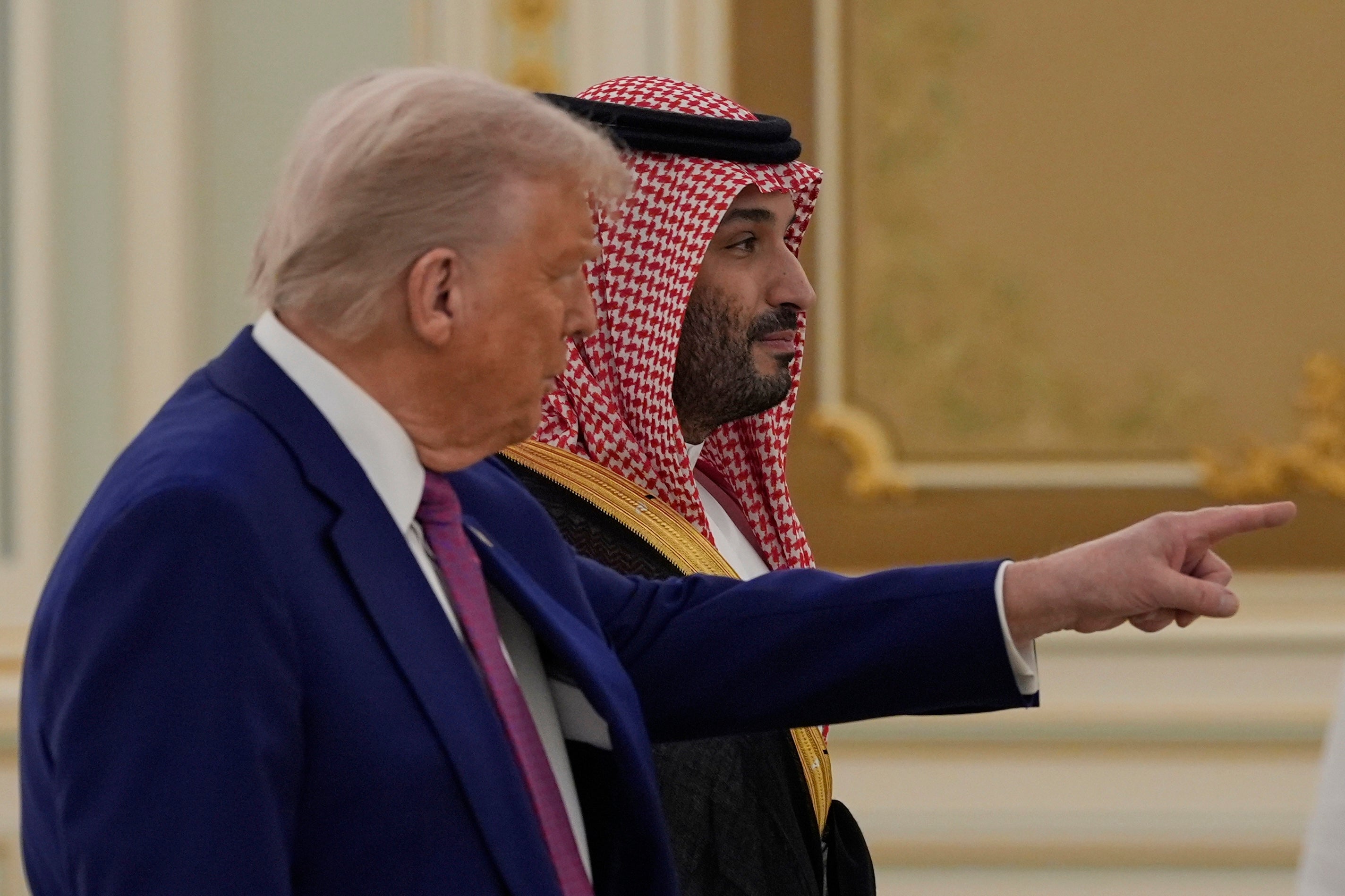 President Donald Trump and Saudi Crown Prince Mohammed bin Salman arrive for a signing ceremony at the Royal Palace in Riyadh, Saudi Arabia, Tuesday, May 13, 2025. 