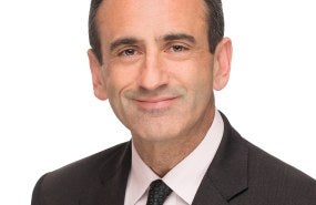A headshot of Philip Gordon