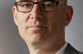 Headshot of Adam Segal