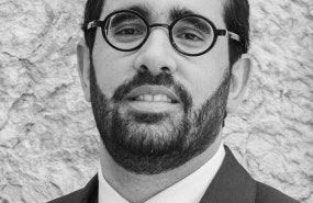 Headshot of Emile Hokayem