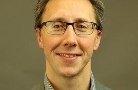 Headshot photograph of Jon Horek