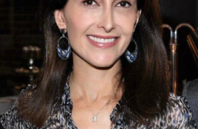 Headshot of Dina Kawar.