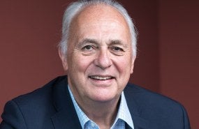 A headshot of Mark Malloch-Brown.