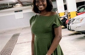 Headshot of Promise Adesokan.