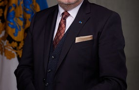 Headshot of Estonian President Alar Karis.