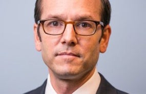 Headshot of Evan Medeiros