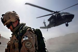 Blackhawk helicopter taking off from an operating base.