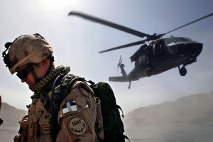 Blackhawk helicopter taking off from an operating base.
