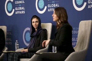 Two women having a discussion on-stage during the International Women's Day: Tech Trailblazers For Social Good event.