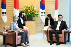 South Korea's Foreign Minister Kang Kyung-wha meets with Japan's Prime Minister Shinzo Abe at Abe's official residence in Tokyo
