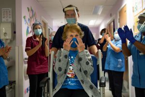 Margaret Keenan celebrates after receiving the world's first COVID-19 vaccine 