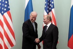 Biden and Putin shake hands 