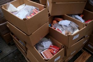 Boxes of food are packed on a pallet waiting to be delivered to families as rural hunger rises due to COVID-19, in Manitowoc, WI