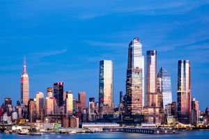 View of the New York City skyline with a blue sky