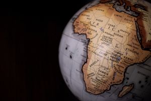 Map of Africa on a globe with a blank black background