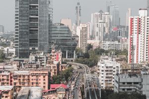 Aerial view of a busy street and a building under construction in Mumbai
