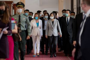 Nancy Pelosi walks with Taiwan's president