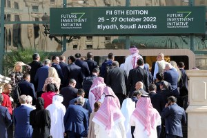 Participants arrive at the Future Investment Initiative (FII) conference in Riyadh, Saudi Arabia