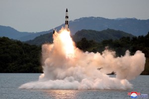 A missile launch is seen at an undisclosed location in North Korea