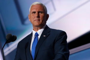 Vice President Mike Pence stands at a microphone.