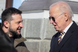 Zelenskyy and Biden shoulder shot, Z left and B right.