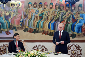 Putin and Xi in Moscow in front of a mural.