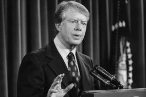 Jimmy Carter speaks at a lectern