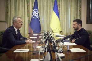 NATO Secretary General Jens Stoltenberg, left, and Ukrainian President Volodymyr Zelenskyy, right, talk during their meeting in Kyiv, Ukraine, Thursday, April 20, 2023.