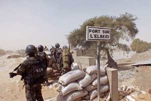Cameroon soldiers stand guard at a lookout post as they take part in operations against the Islamic extremists group Boko Haram