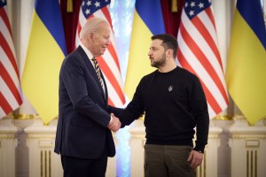 Ukrainian President Volodymyr Zelenskyy and US President Joe Biden shake hands during their meeting in Kyiv