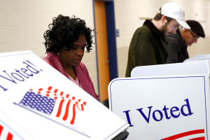 Voters work on their ballots in a polling place in Charleston, South Caroline on February 29, 2020.