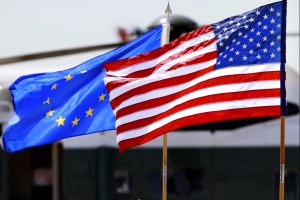 the US and European Union flags wave