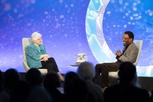 Fay Hartog-Levin and Judge Chile Eboe-Osuji on stage.