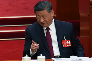 Chinese President Xi Jinping gestures during the opening session of the National People's Congress at the Great Hall of the People in Beijing, China on March 5, 2025.
