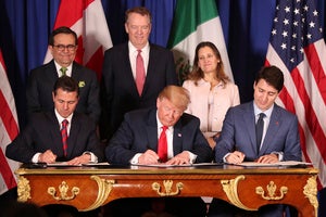 In this Nov. 30, 2018 file photo, President Donald Trump, center, sits between Canada's Prime Minister Justin Trudeau, right, and Mexico's President Enrique Pena Nieto as they sign a new United States-Mexico-Canada Agreement