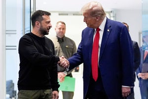 President Donald Trump and Ukraine's President Volodymyr Zelenskyy shake hands
