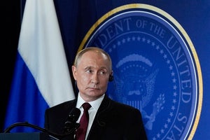 Russia's President Vladimir Putin speaks during a news conference in Alaska