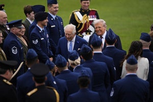 Britain's King Charles III and President Donald Trump speak to military personnel at Windsor Castle, England, on September 17, 2025.
