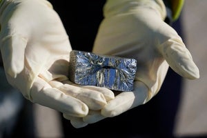 A person holding refined tellurium at the Rio Tinto Kennecott refinery in Magna, Utah.