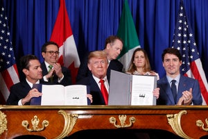President Donald Trump, Justin Trudeau and Enrique Pena Nieto sign the USMCA