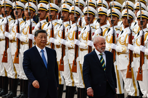 Chinese President Xi Jinping and Brazil's President Luiz Inacio Lula da Silva walk past the honor guard during a welcome ceremony at the Great Hall of the People in Beijing, China on May 13, 2025.