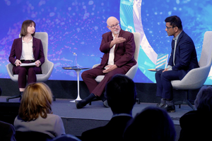 Speakers on the Council's stage.
