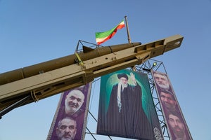 an Iranian missile and flag
