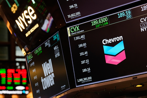 A Wall Street screen displaying stock numbers.