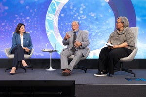 Speakers on the Council's stage