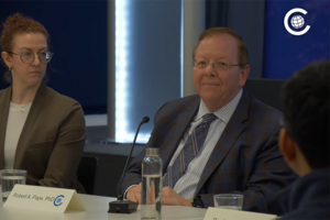 Robert Pape speaking to a roundtable of Emerging Leaders.