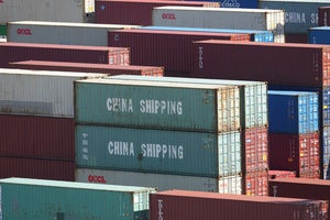 China Shipping containers sit stacked up at the Long Beach Container Terminal