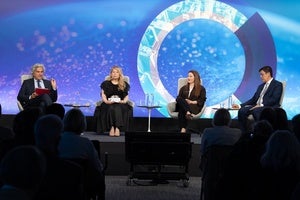 Speakers on a stage