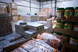 Food items wait to be packaged and distributed at a Feeding America food bank