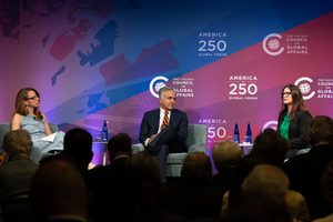 Panel of speakers on a stage